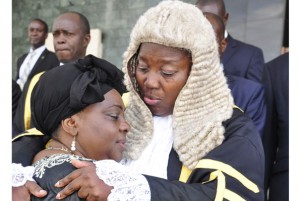 Speaker Rebecca Kadaga comforts Gender minister Mary Karooro Okurut at Parliament yesterday. This was during a special session to honour the minister’s late husband Stanislaus Okurut. PHOTO BY GEOFFREY SSERUYANGE