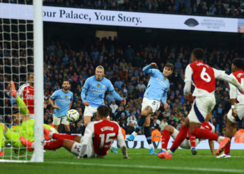 Stones scores deep in injury time as Man City salvage 2-2 draw with Arsenal