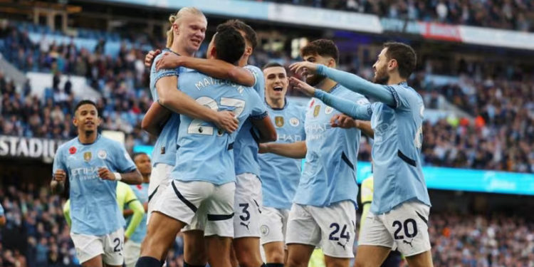 Man City claim top spot with Saints win