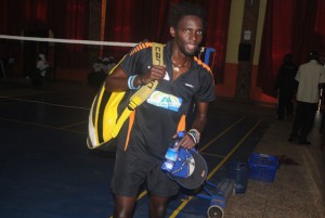 Africa’s top seed Edwin Ekiring leaves Nsambya Sharing Hall after being shown the exit by Italian Wisnu Aryo Putro on Friday. PHOTO BY EDDIE CHICCO.