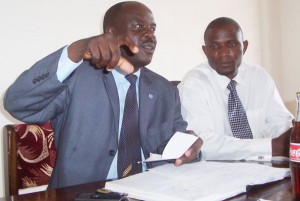 Fufa publicist Rogers Mulindwa (Left) addressing the Press recently